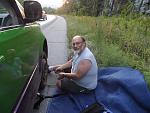 Changing the tire at the side of the Interstate in Vermont, after waiting two hours.  AAA contractors refused to come - "too dangerous."  Tire "blew...
