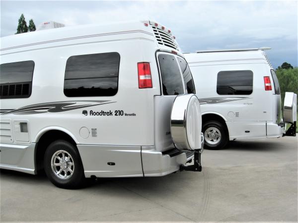 2007 Roadtrek 210 Versatile on left and 2016 Roadtrek 210 Popular on right. The 2007 had silver on bottom side body. The 2016 RT is all white. I swapped the tires and rims. The 2016 RT 210 Popular now has the 2007 Tires and wheels from the 2007 RT 210 Versatile as shown on this picture.