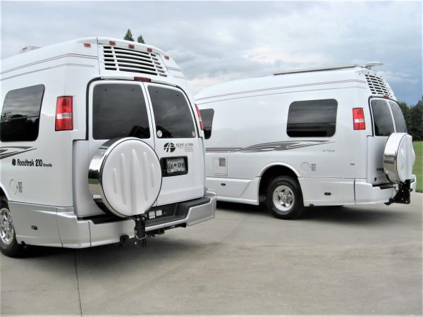 2007 Roadtrek 210 Versatile on left and 2016 Roadtrek 210 Popular on right.