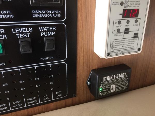 Trik-L-Start moved inside under Trimetric RV2030 battery Monitor