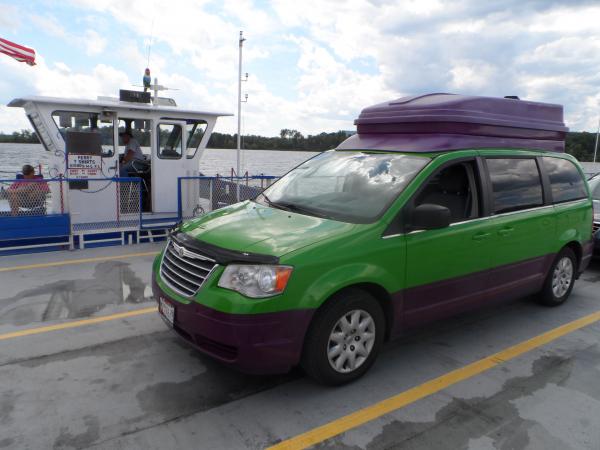 Waiting for the Ticonderoga Ferry linking NY and Vermont.  The color scheme makes for an instant conversation starter...and ,no, we are not going to repaint the vehicle.  I do need to buff out the oxidized fiberglass "Penthouse".